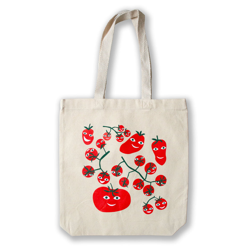 happy smiling tomatoes screenprinted on a natural canvas tote